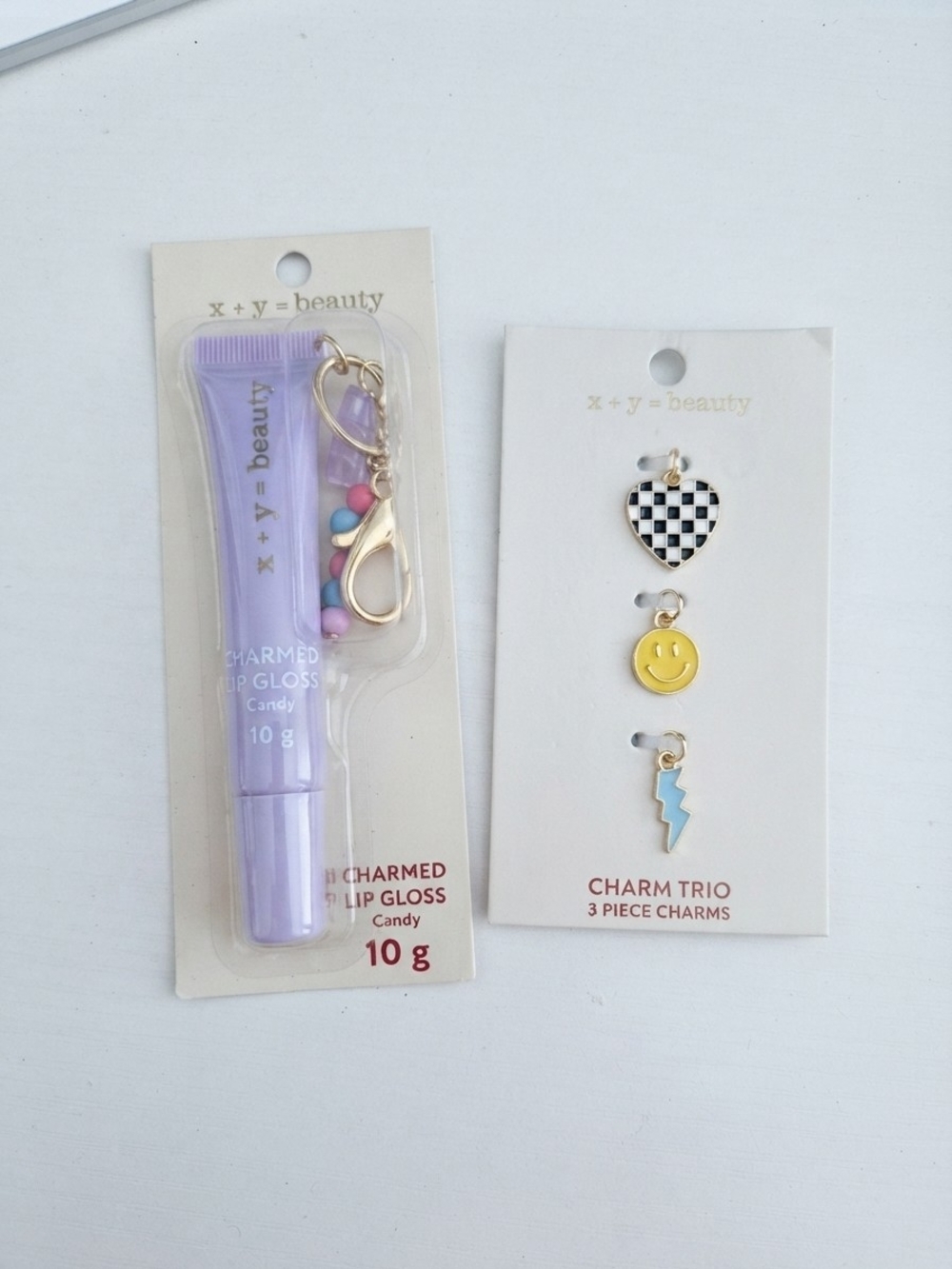 NIP x + y = beauty Charmed Lip Gloss (Candy) & 3-Piece Charm Trio Set  (0218)